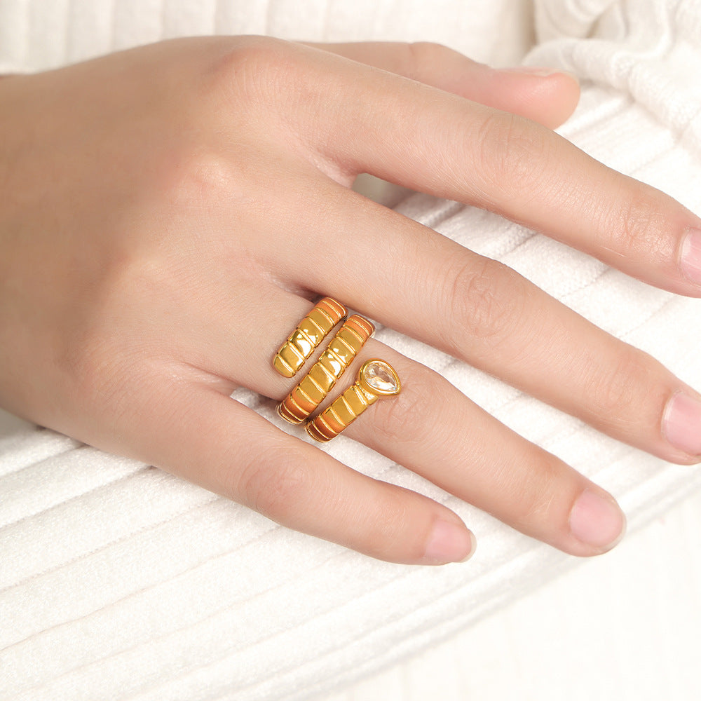 New fashionable retro personalized titanium steel gold-plated with water drop-shaped zircon winding texture open ring for women