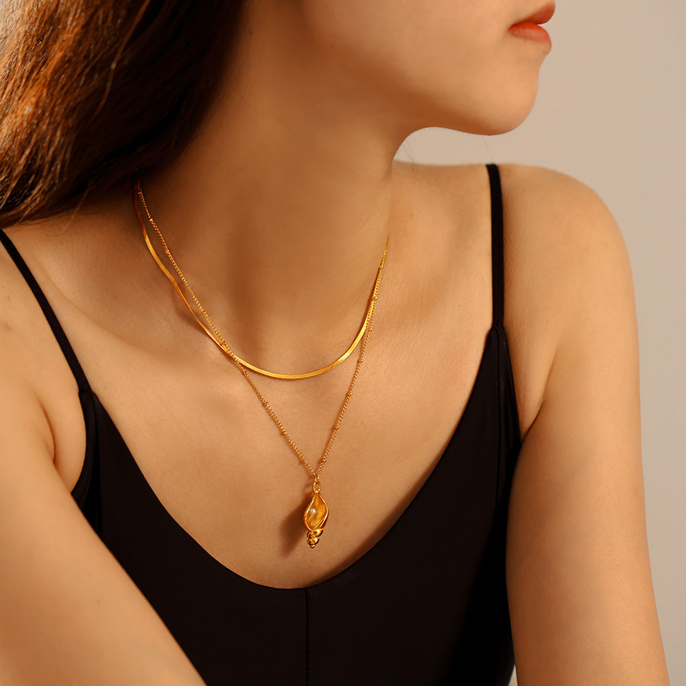 Conch inlaid imitation pearl collarbone necklace women's titanium steel 18k plated real gold niche versatile necklace wholesale 99