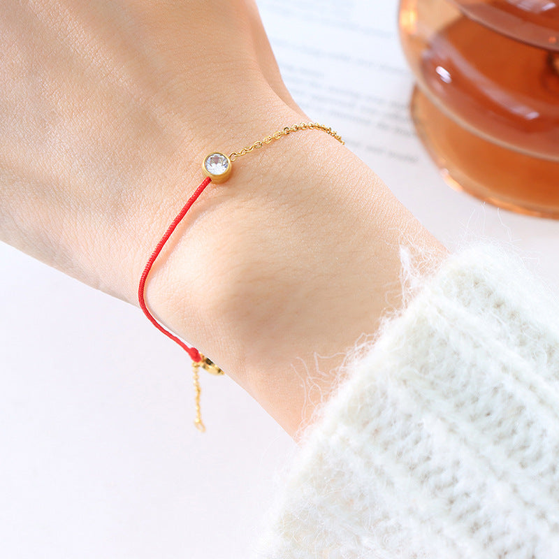 Fashion simple red rope bracelet men and women light luxury niche exquisite titanium steel gold-plated chain woven hand rope girlfriend versatile 99