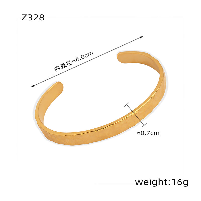 New simple personality niche design titanium steel gold-plated irregular concave-convex hammer surface opening bracelet women's jewelry wholesale 99