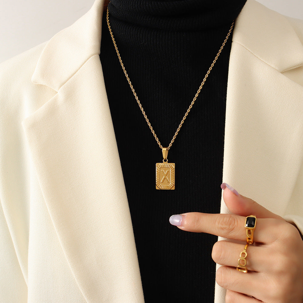 Cold wind niche light luxury retro high-end sense tag necklace titanium steel plated 18K real gold women's jewelry