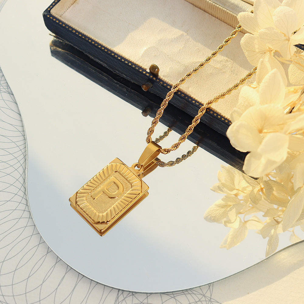 Cold wind niche light luxury retro high-end sense tag necklace titanium steel plated 18K real gold women's jewelry