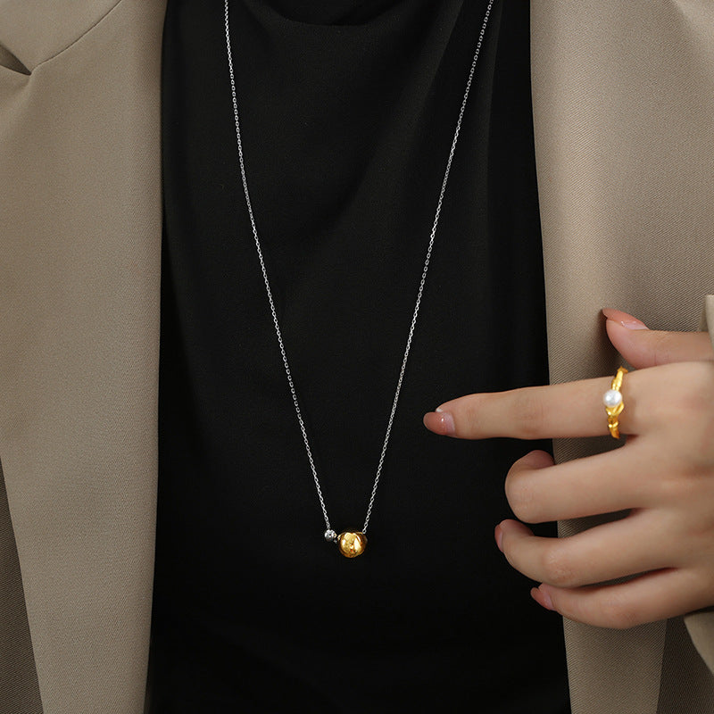 Unique personality, niche elegance, fashion, geometric beaded design chain, simple and versatile titanium steel gold-plated sweater chain