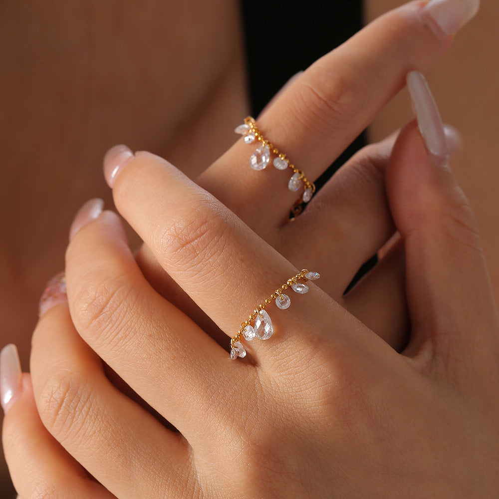 Cold wind personalized rice bead chain jewelry crystal stone pendant pull button titanium steel gold-plated ring 99