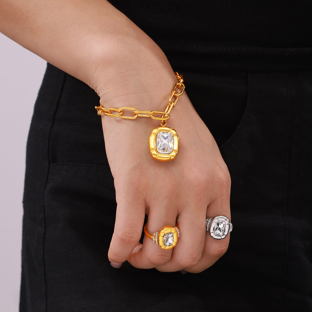 Retro light luxury simple cold wind jewelry texture oval brand diamond design titanium steel jewelry set 99