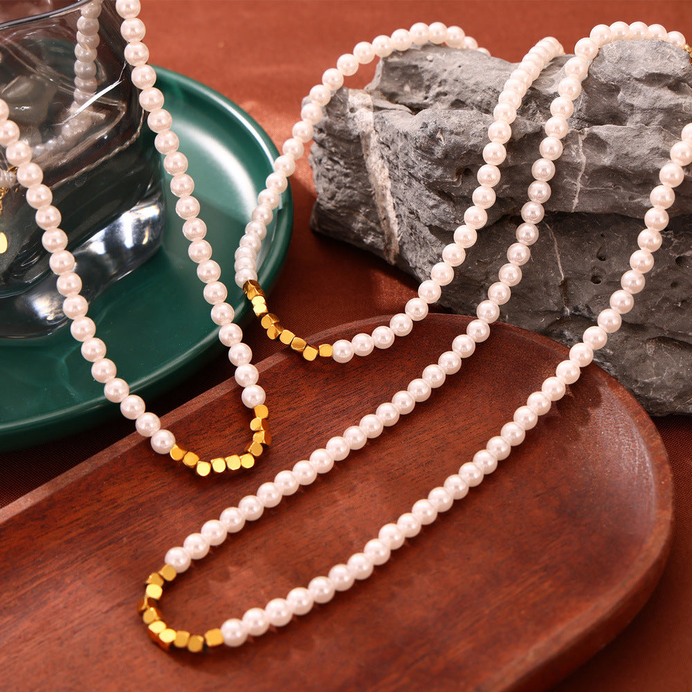 Hepburn style retro light luxury style temperament titanium steel necklace broken silver small rice beads beaded design sense snake bone chain