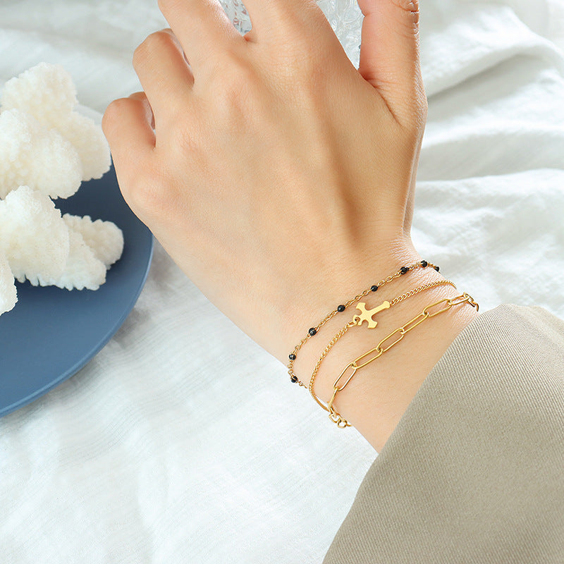 Premium light luxury three-layer stacked cross bracelet titanium steel 18k gold girlfriend jewelry women