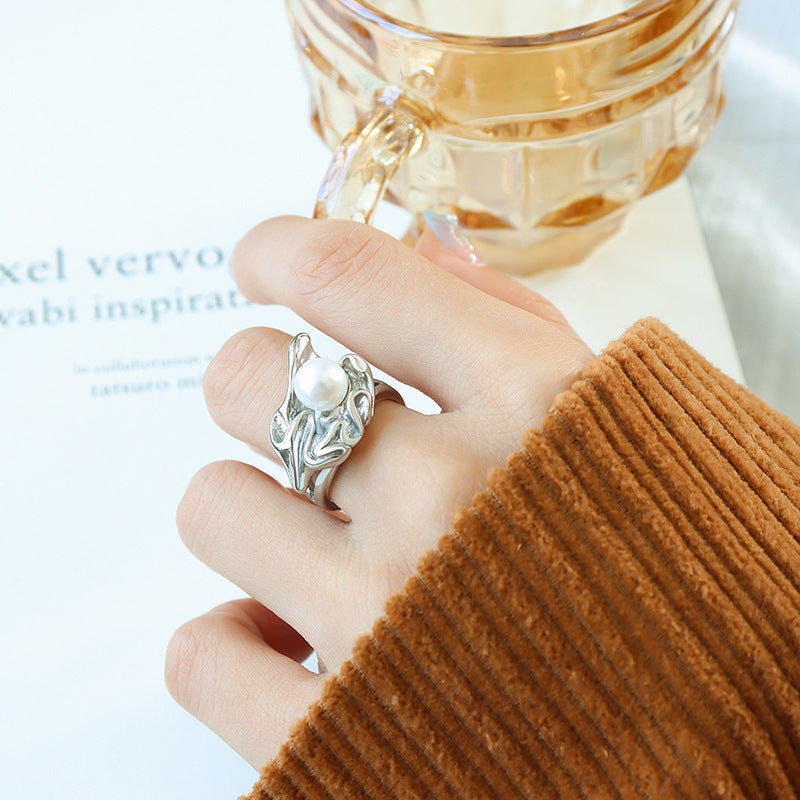 Tide brand designer European and American style fashionable pleated lava ring women's irregular titanium steel gold-plated pearl ring