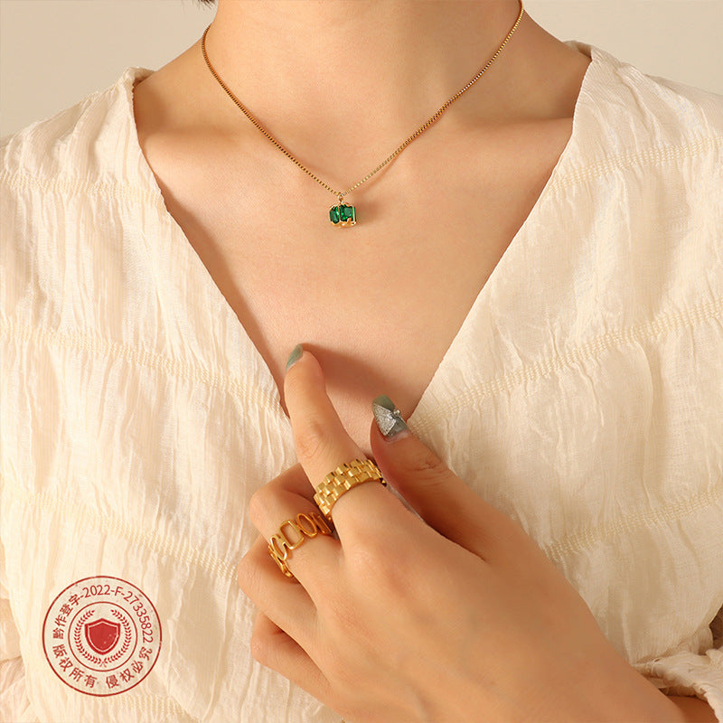 Cold wind niche design non-fading titanium steel four-claw buckle emerald zircon necklace earrings jewelry set