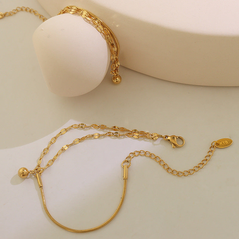 Detailed niche and versatile campus style double-layer lip chain bracelet, small steel ball pendant, titanium steel gold-plated jewelry E15299
