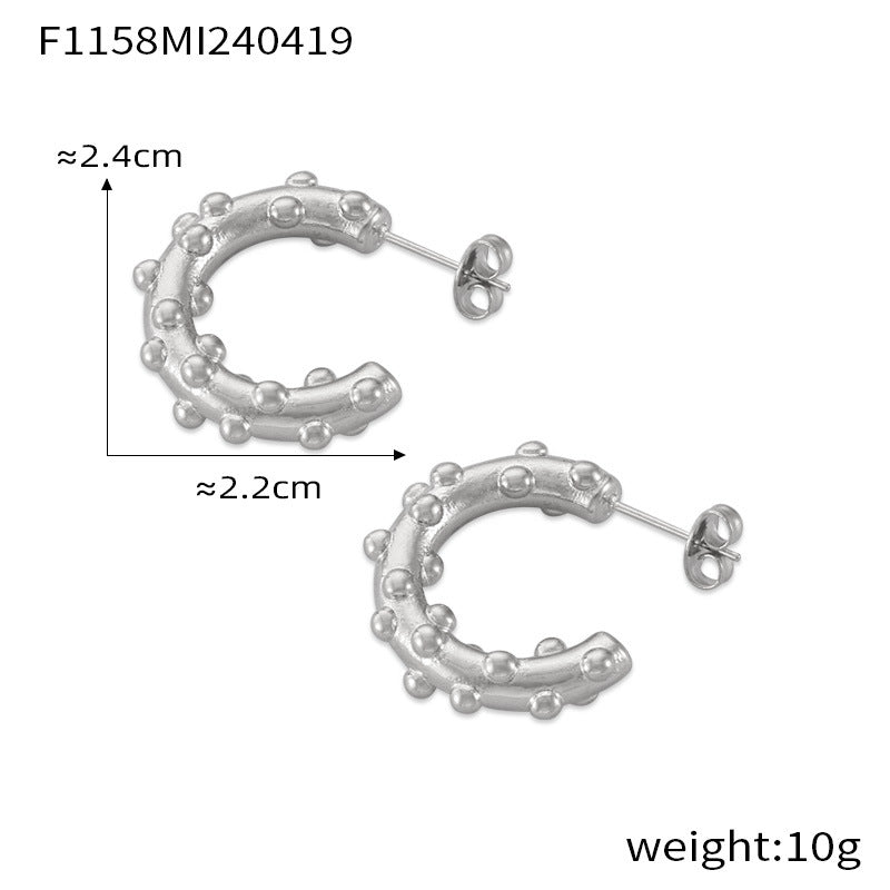Retro niche personality temperament jewelry geometric engraving texture design titanium steel gold-plated C-shaped earrings