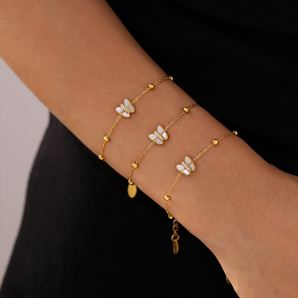Light luxury niche butterfly bead bracelet, natural fritillary inlaid 3A zircon titanium steel plated 18k real gold, beautiful color retention women 99