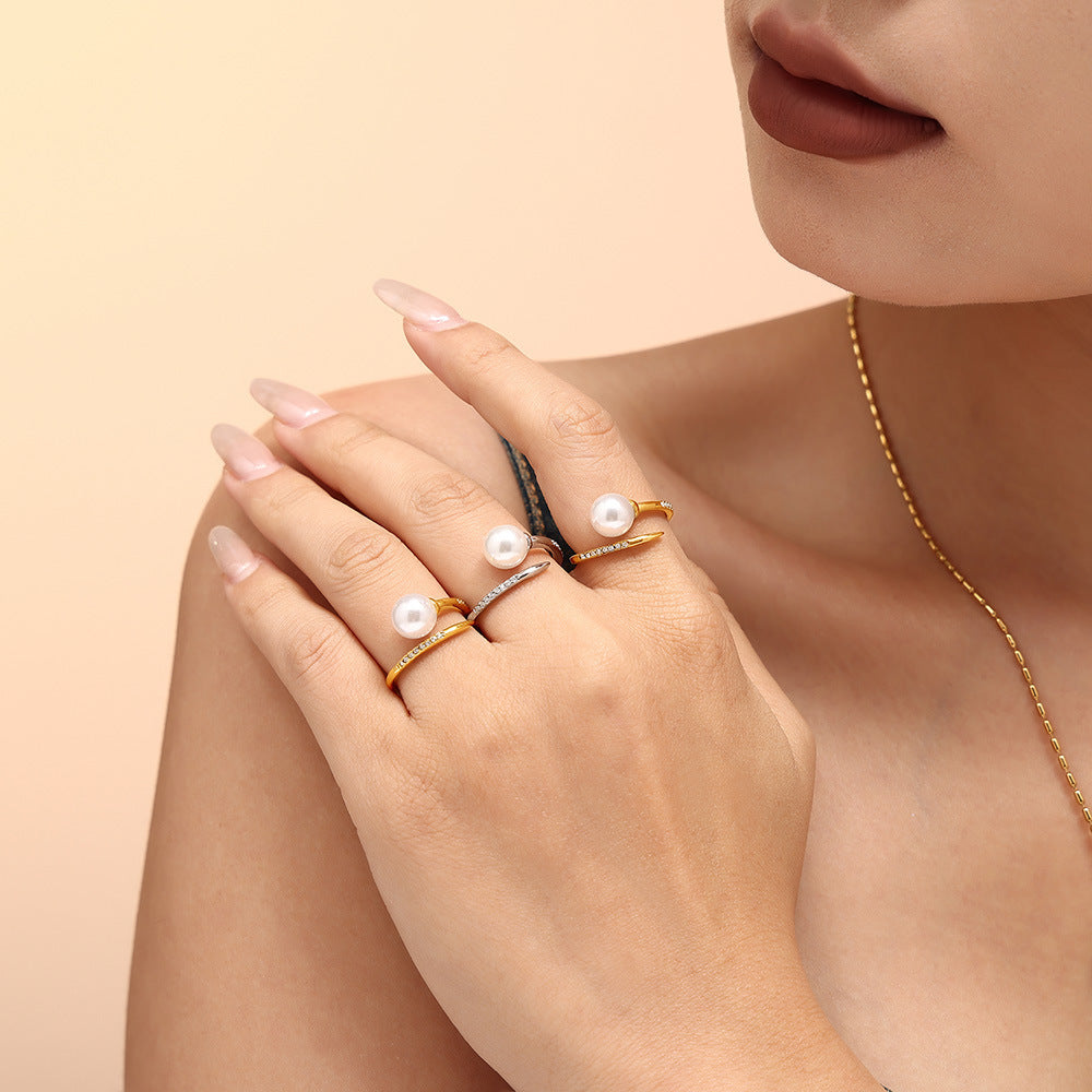 Exquisite and elegant micro-inlaid zircon Shijia pearl open ring for women, niche light luxury titanium steel ring jewelry wholesale 99