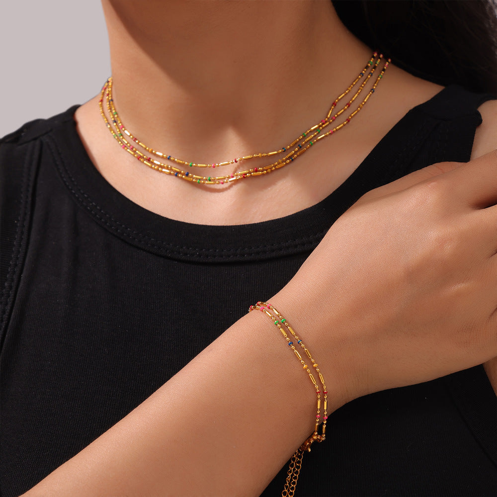Fresh and elegant simple personality versatile commuter jewelry rice bead chain dripping oil design titanium steel jewelry set 99