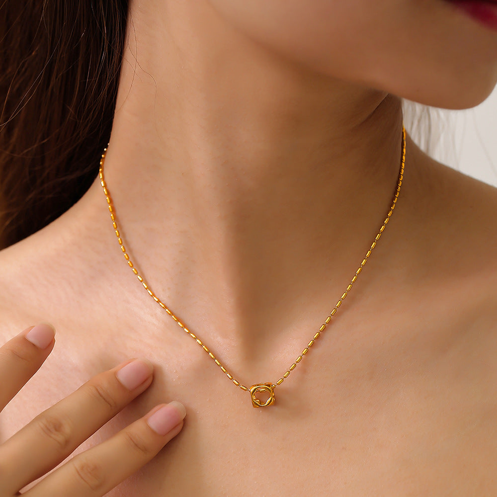 Leisure vacation style niche simple rice bead chain jewelry personalized hollow square pendant titanium steel gold-plated necklace pp
