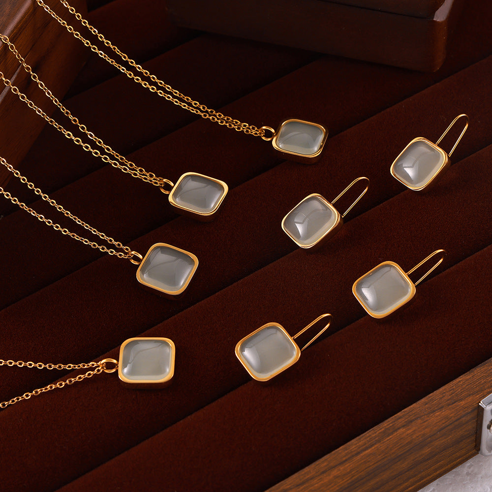 Cold wind temperament elegant jewelry geometric square brand resin design pendant titanium steel jewelry set