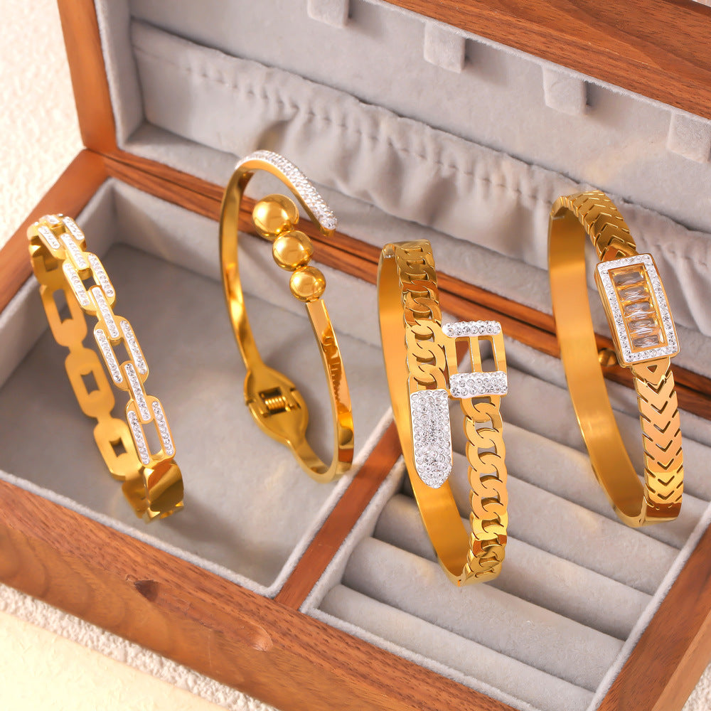 Simple personality niche geometric chain modeling jewelry hollow diamond design titanium steel gold-plated bracelet pp