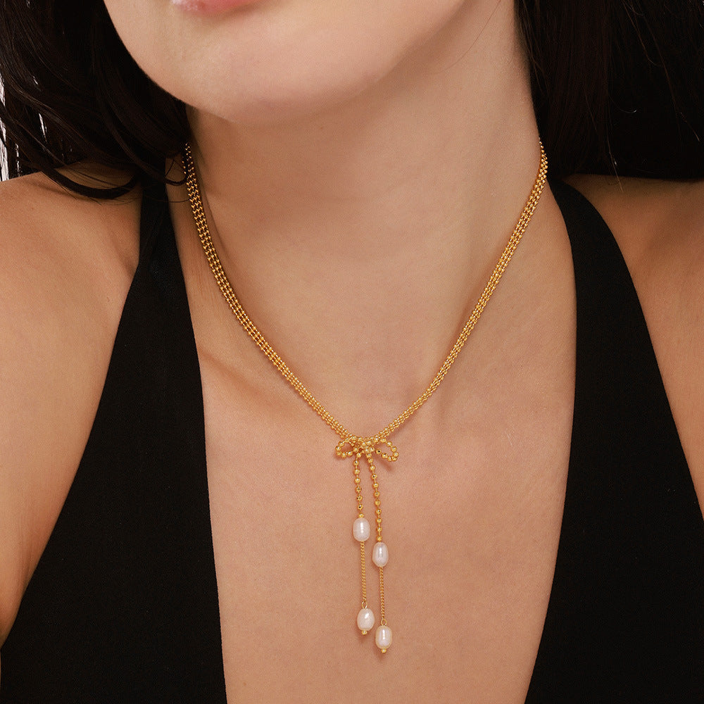 Bow stud earrings fringed freshwater pearl necklace stainless steel plated 18K real gold niche sweet wind set