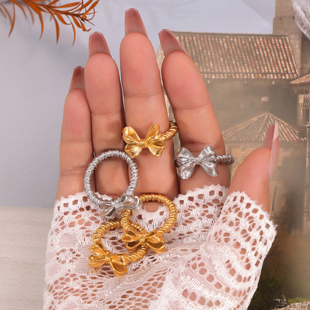 Stylish and simple personalized bow design ring geometric twist ring titanium steel gold-plated versatile index finger ring