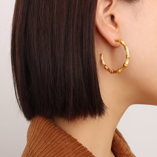 Niche design fashionable geometric C-shaped bamboo earrings electroplated 18K gold non-fading personalized earrings F565