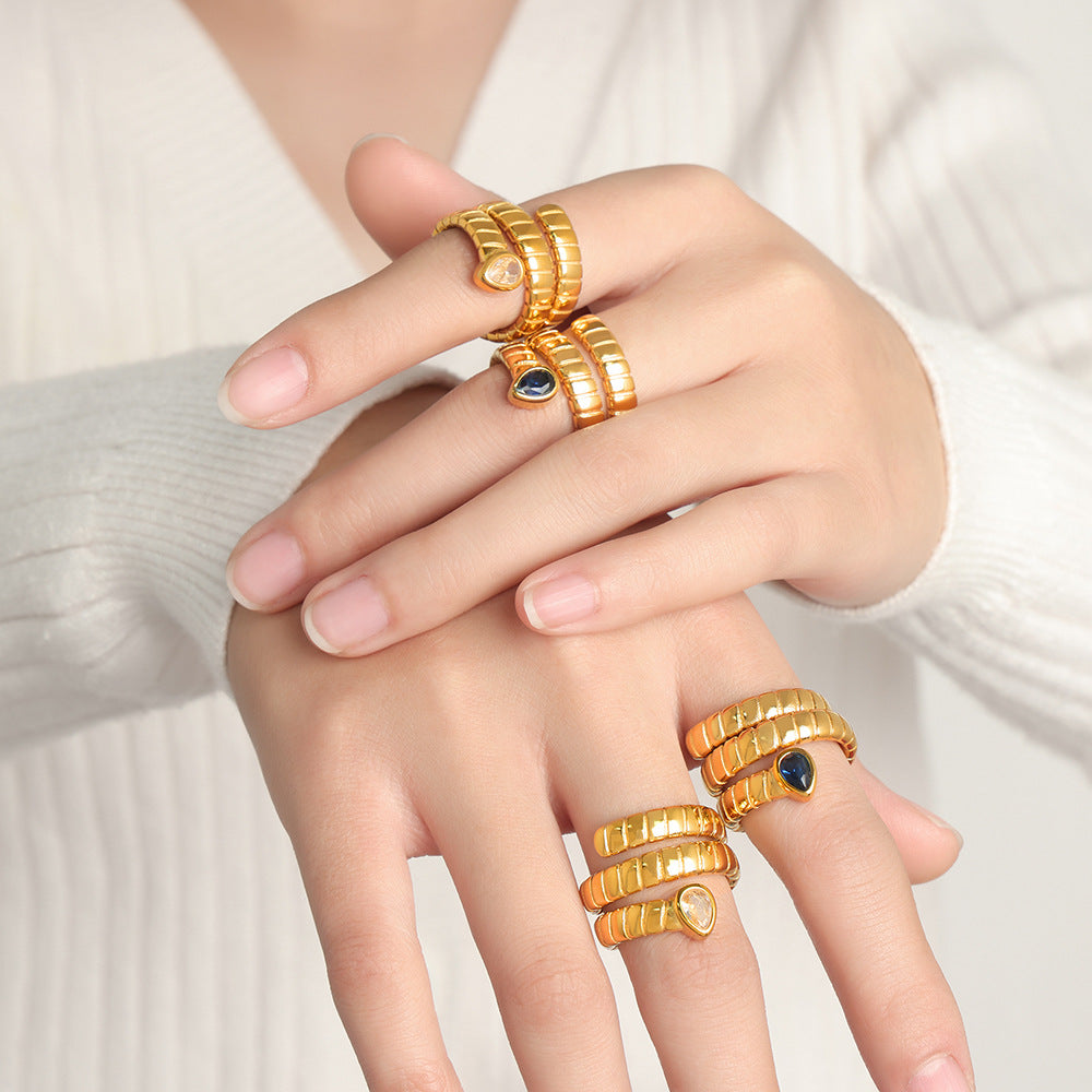 New fashionable retro personalized titanium steel gold-plated with water drop-shaped zircon winding texture open ring for women