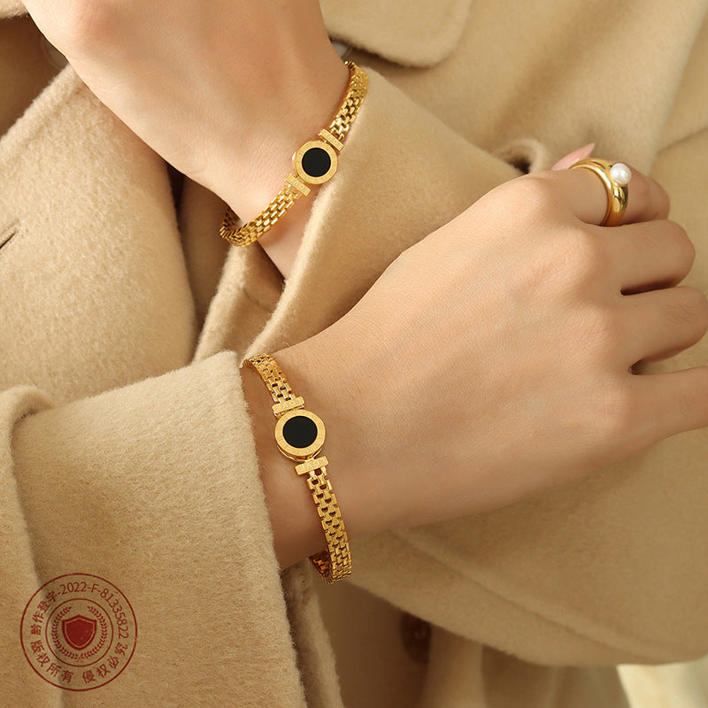 Light luxury fashion personality does not fade niche bracelet design titanium steel plated 18K gold wholesale jewelry women 99