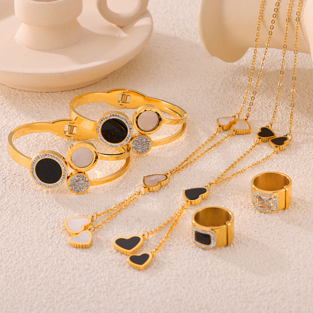 Temperament elegant light luxury zircon jewelry with diamond design sense Fritillary love titanium steel gold-plated jewelry set pp