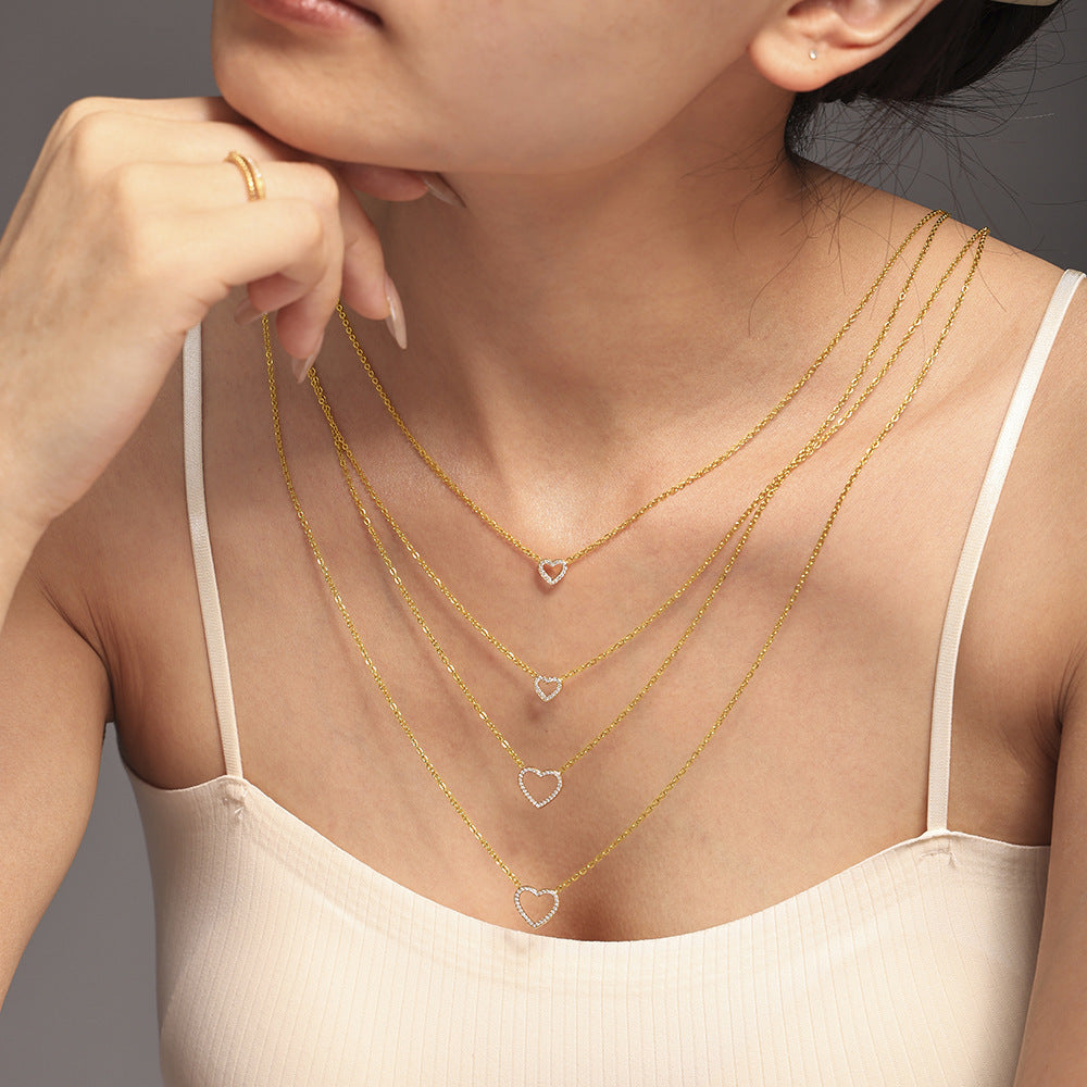 Hot-selling British niche design double-layer necklace female love zirconium embedded impermeable steel pp