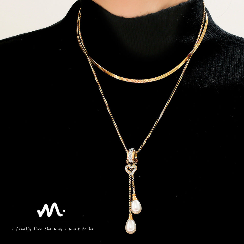 European and American light luxury buckle love tassel imitation pearl pendant necklace stainless steel gold-plated stacked necklace jewelry female pp