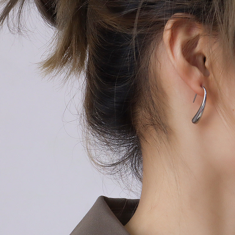 Tide niche design Unique small water drop curved hook geometric stud earrings Female cold wind, titanium steel F31599