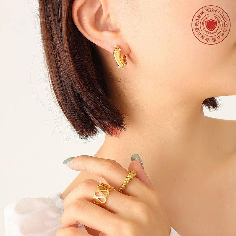 Hot-selling titanium steel gold-plated imitation pearl zircon inlaid C-shaped earrings retro temperament personalized earrings 99