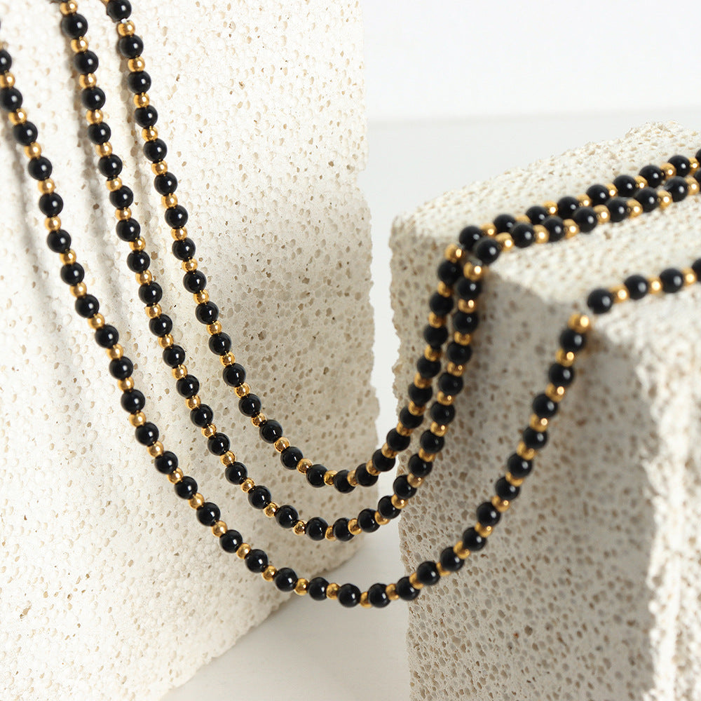 New light luxury high-end niche design black agate handmade beaded titanium steel bead necklace female pp