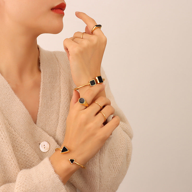 Open soft wire high elasticity versatile triangular square black shell bracelet, titanium steel plated 18K real gold jewelry