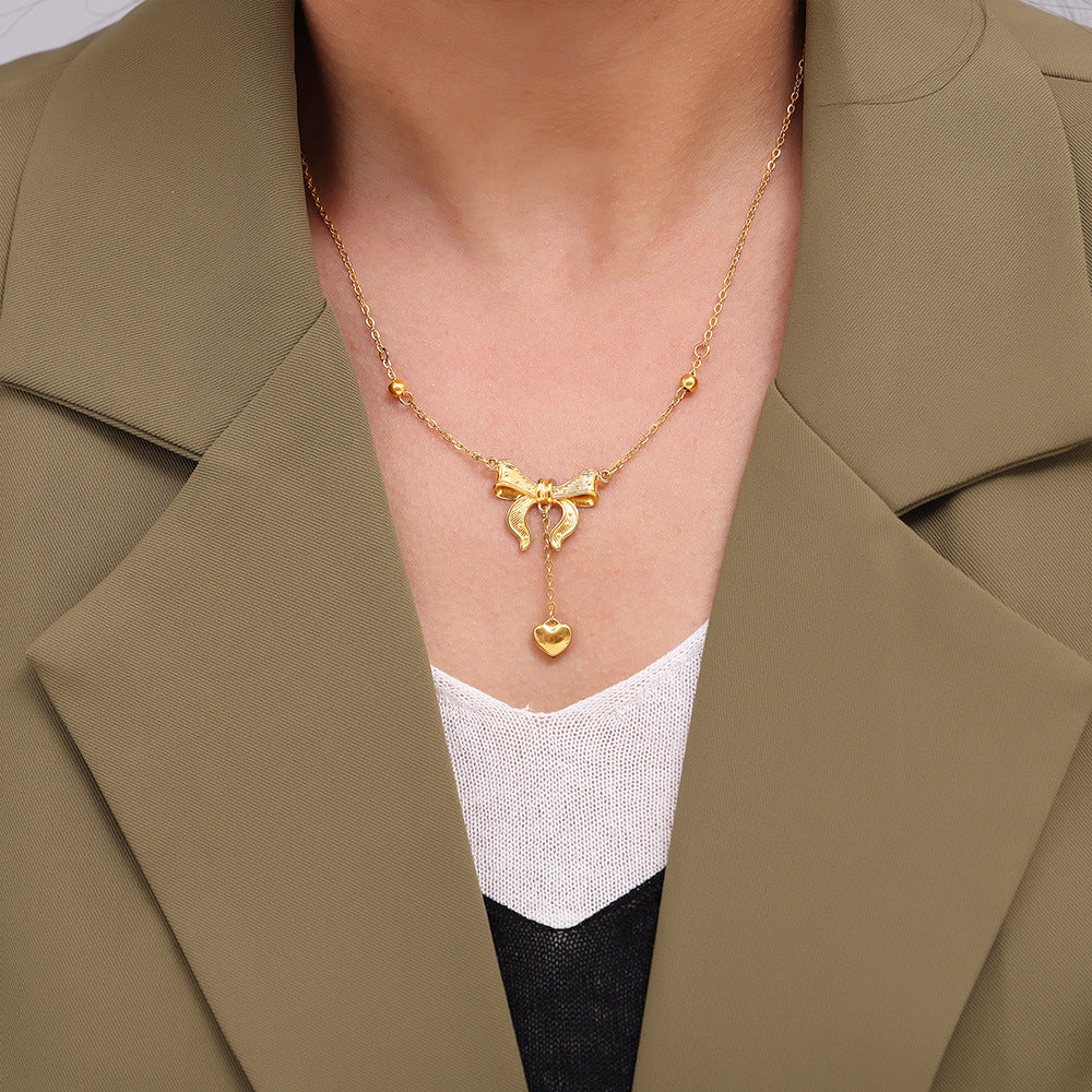 Chic wind love fringed bow collarbone necklace sweet wind women's necklace titanium steel plated 18k real gold