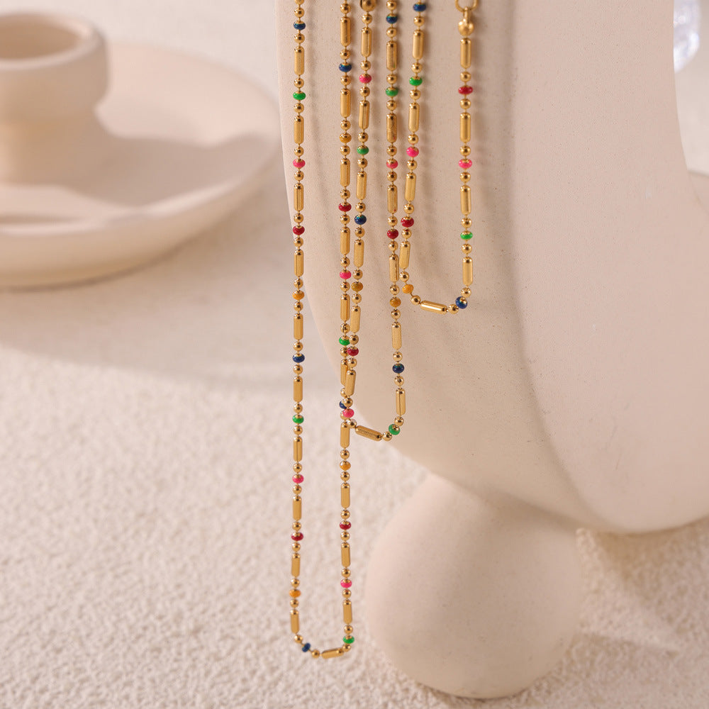 Fresh and elegant simple personality versatile commuter jewelry rice bead chain dripping oil design titanium steel jewelry set 99