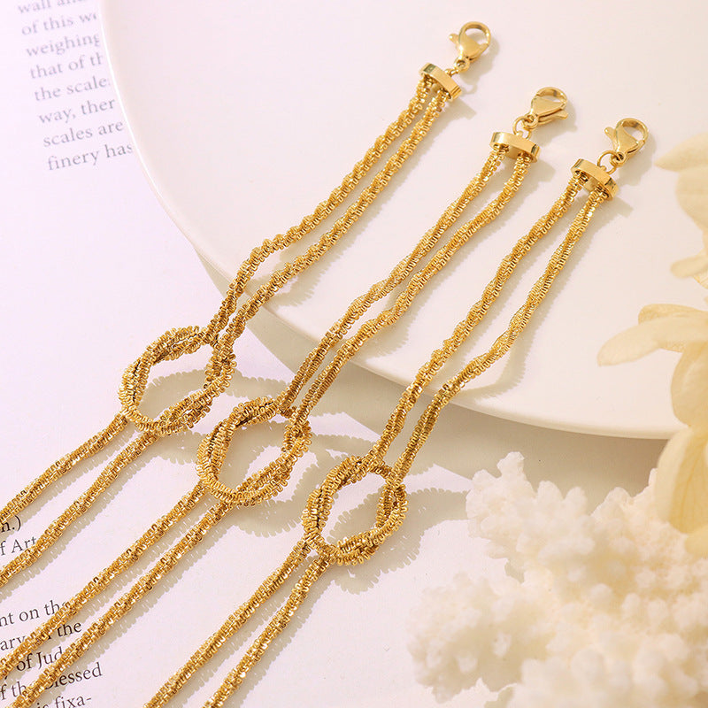 Cross-style geometric knotted bracelet female, niche design titanium steel gold-plated non-fading hand jewelry 99