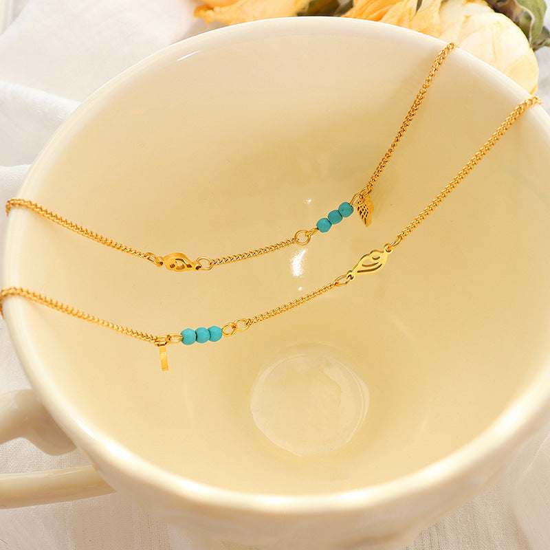 Niche design trendy cold wind road turquoise wings anklet jewelry versatile temperament titanium steel gold-plated S09799