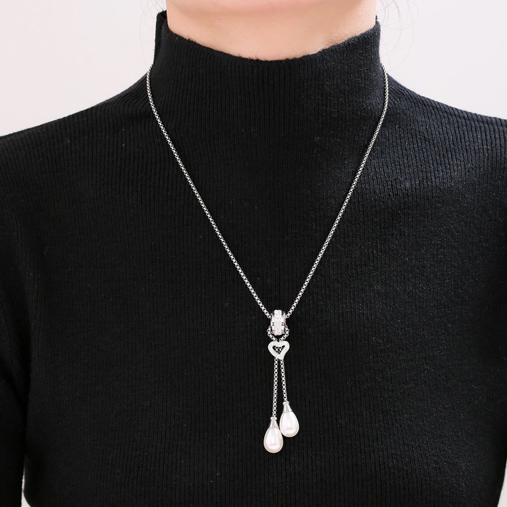 European and American light luxury buckle love tassel imitation pearl pendant necklace stainless steel gold-plated stacked necklace jewelry female pp
