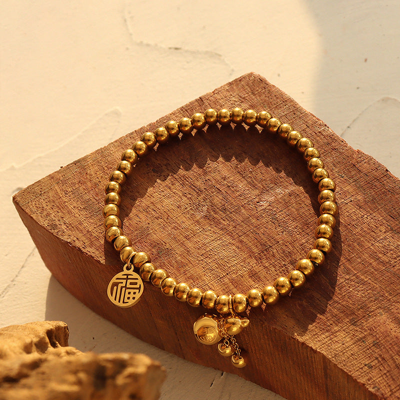 Fuxi bead bracelet women's gourd lucky bag elastic line bracelet titanium steel material gold-plated color-preserving jewelry women
