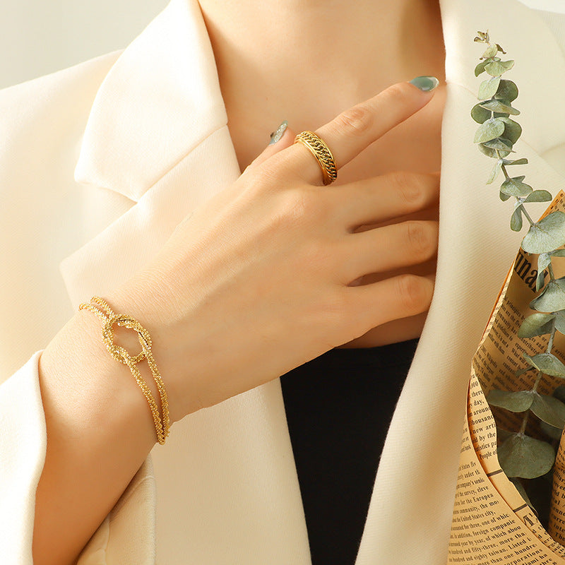 Cross-style geometric knotted bracelet female, niche design titanium steel gold-plated non-fading hand jewelry 99