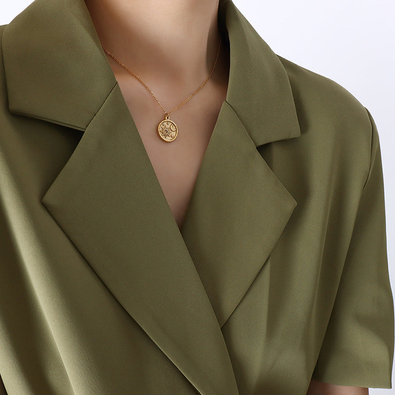 Geometric cold wind versatile zircon star and moon romantic necklace, titanium steel gold-plated round pendant necklace.
