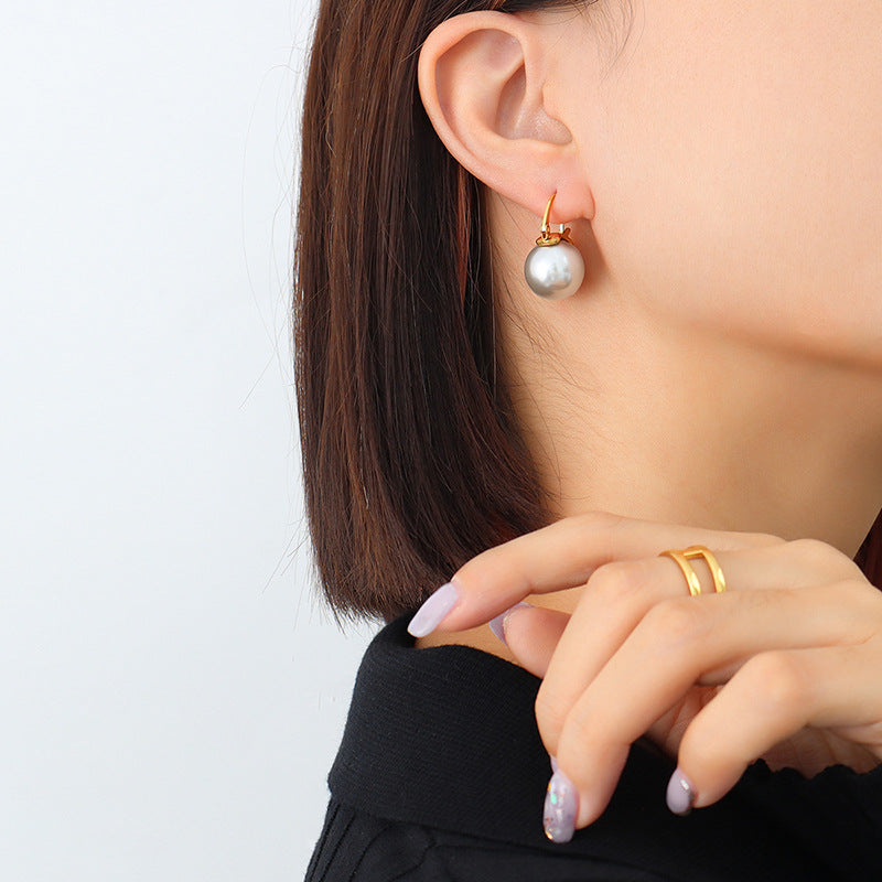 Cold wind light luxury exaggerated imitation pearl earrings women's titanium steel plated 18K real gold ear jewelry F36999
