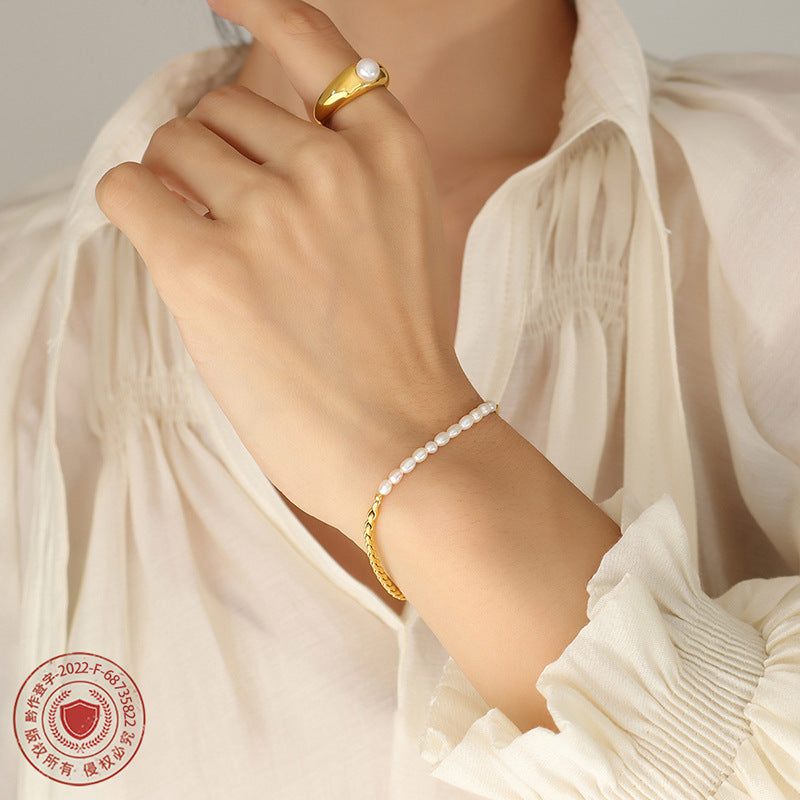 Non-fading bracelet jewelry fashion commuter freshwater pearl OT buckle titanium steel plated 18K gold niche design women