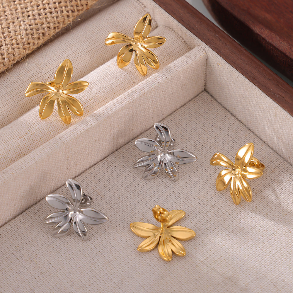 Fresh and simple personality Mori jewelry geometric texture flower design titanium steel gold-plated casual style stud earrings