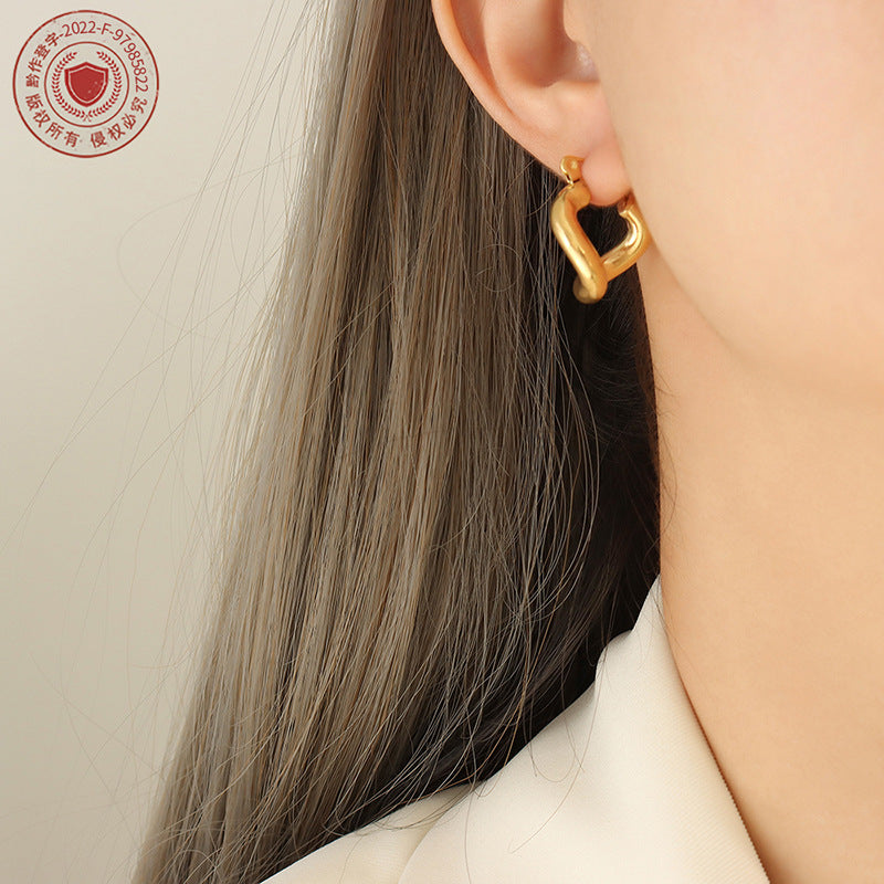 Marka style jewelry geometric twist special-shaped titanium steel plated 18k gold retro personality niche earrings