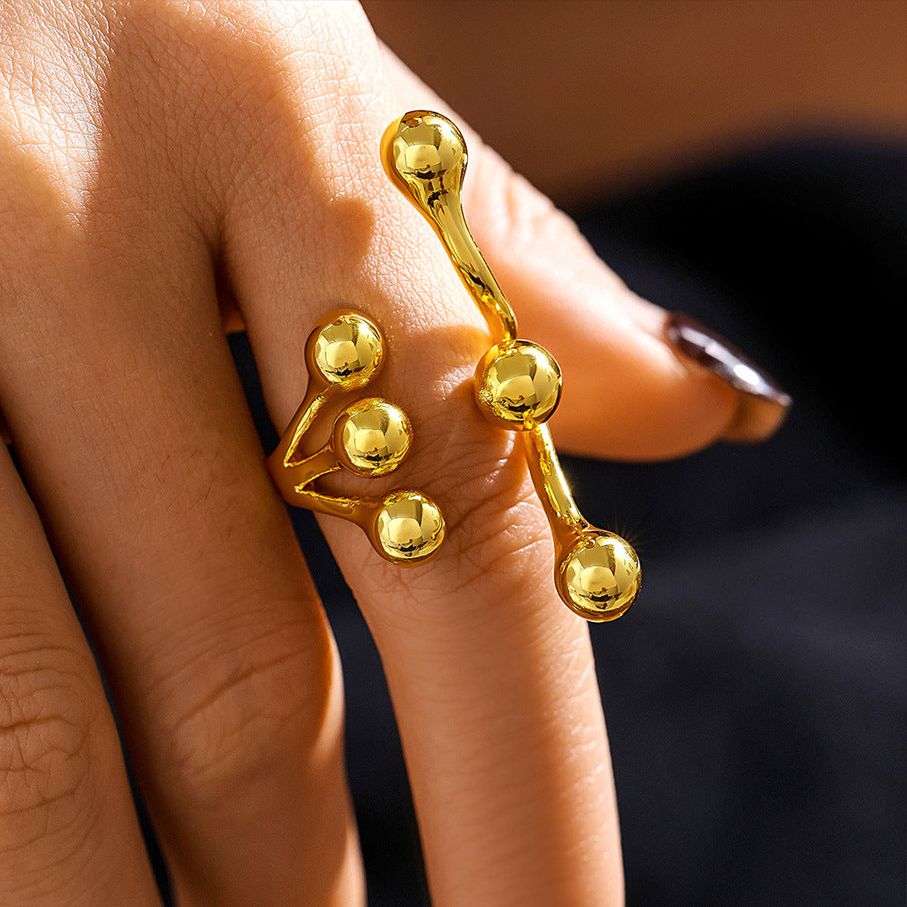 Ball casting ring Titanium steel water-plated 18K gold branch opening design creative exaggerated fashion ring spot