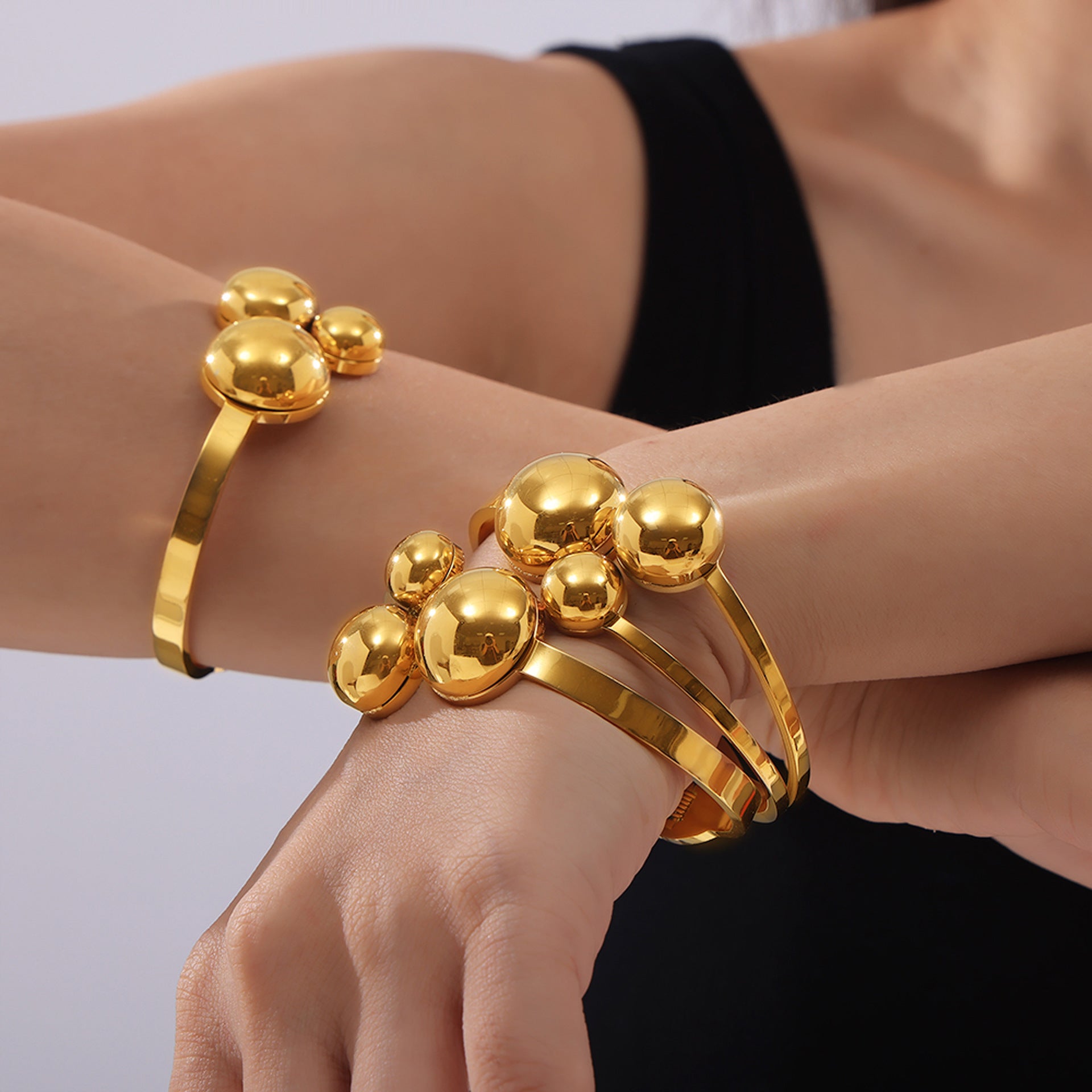 Minimalist style fashion commuter personality niche jewelry ball shape design sense multi-layer titanium steel gold-plated spring bracelet