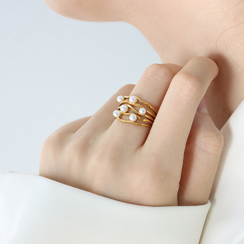 Classical retro corrugated wave imitation pearl ring, simple temperament niche design titanium steel gold-plated jewelry women