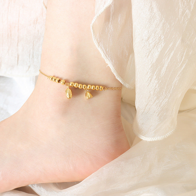 Hot-selling personalized fashion lotus pod lotus pendant titanium steel beaded anklet plated with 18k gold foot jewelry women's jewelry