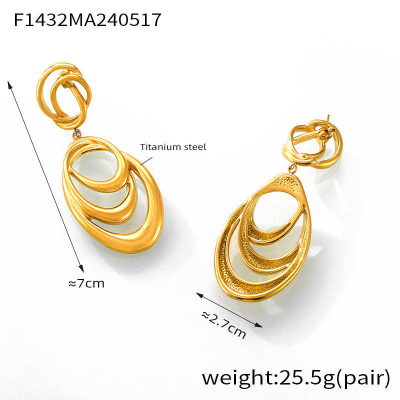 Hip-hop style, unique personality, niche exaggerated earrings, geometric line winding design sense, double-layer titanium steel gold-plated earrings